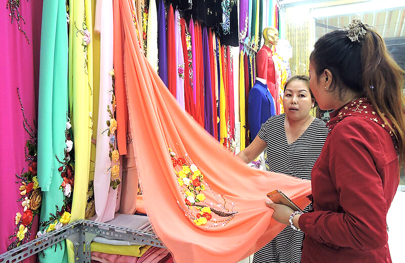Mô tả công việc thợ may áo dài chi tiết